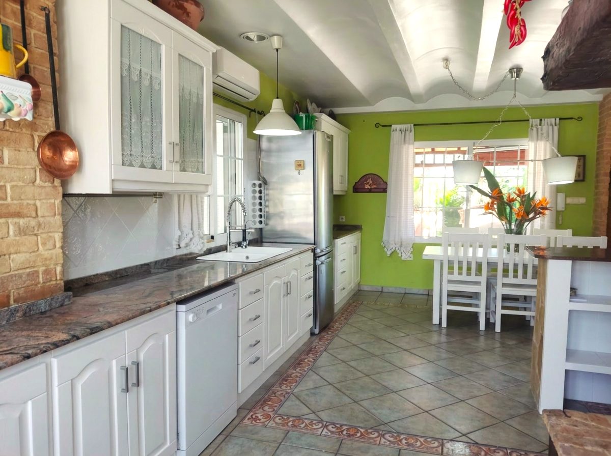 Cocina y salón de Villa Santos