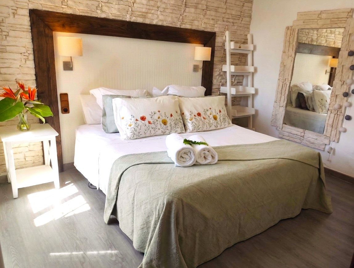 Mape · Dormitorios y baños de Villa Santos